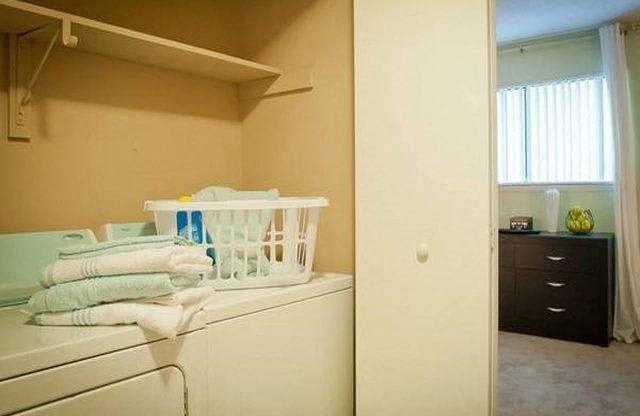 In-unit laundry at Emory Woods Apartments, Durham, NC.