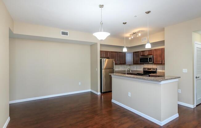 a kitchen with a wood floor