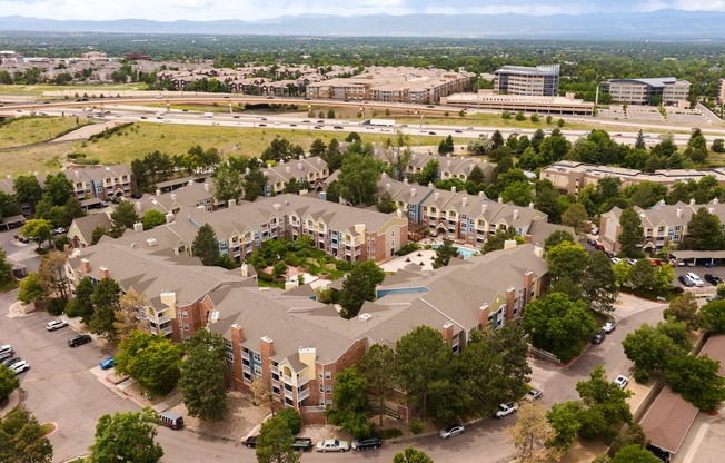 an aerial view of an apartment complex in the city