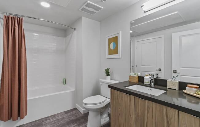 Bathroom with a bathtub at Array La Mesa, La Mesa, 91942