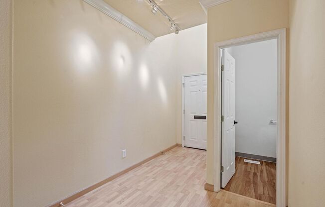 $500 move-in special! Unique 2-bdrm/2.5-bath duplex w/ A/C—Private patio, storage, garage w/ washer/dryer