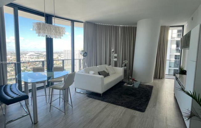 Remarks:	Enjoy stunning Skyline and Bay views from the wraparound balcony of this furnished 2-bedroom, 2-bathroom corner unit for rent at Brickell Heights.
