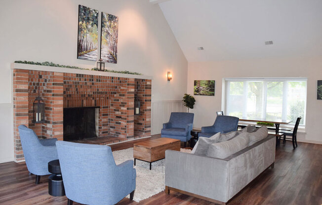 Clubhouse with High Ceiling and Fireplace at Newport Village Apartments, Portage, MI