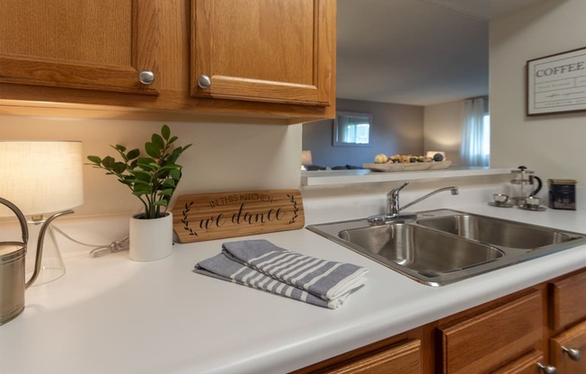 This is a photo of the kitchen in the 822 square foot, 2 bedroom, 1 bath floor plan at Village East Apartments in Franklin, OH.