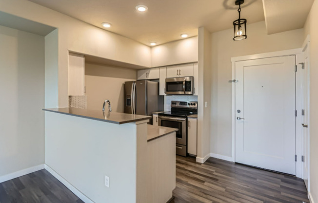 Beautifully Updated Bethany Condo with Private Patio Backing to Greenspace & Prime Location!