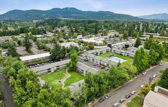 A view of a town with a lot of buildings and cars.