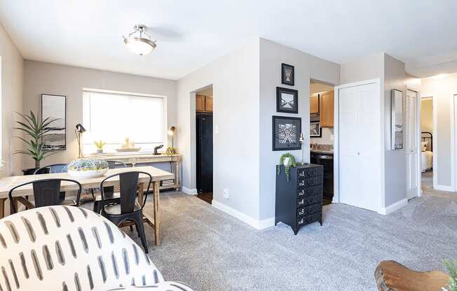 a living room with a dining room and a kitchen