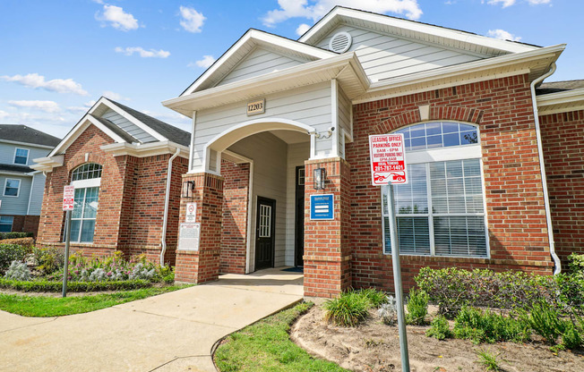 a building with a no parking sign in front of it