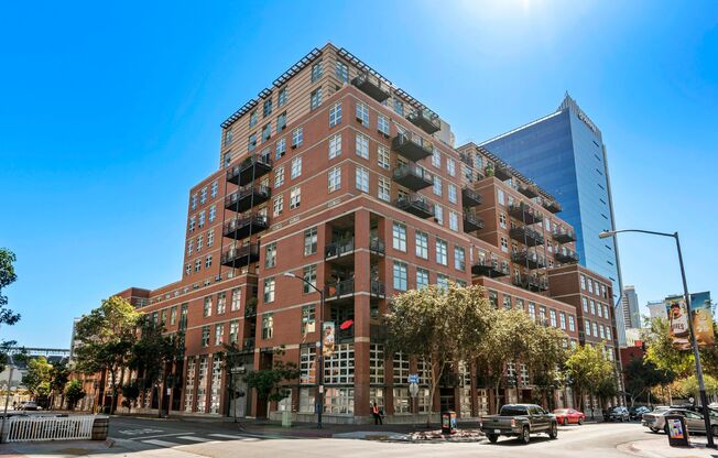 Expansive East Village loft at Parkloft, available now! 1 parking space included! Small pet OK!
