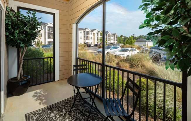 Private Balcony With Seating at Abberly Crossing Apartment Homes by HHHunt, Ladson, 29456