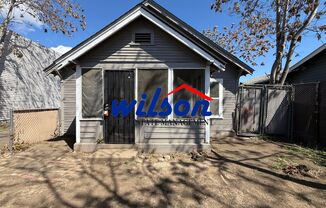 2-Bedroom Home with Fenced Yard & Rear Parking!