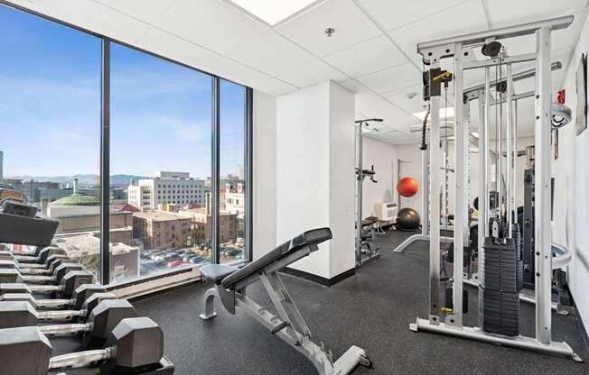 A gym with a view of the city.