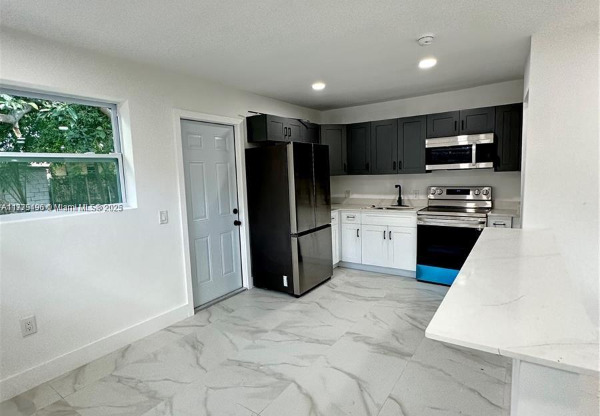 1445 NW 34 ST