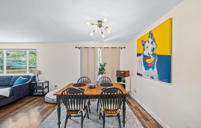 Recently Updated 2BA, 1.5BA Condo with Fenced Yard and Garage Parking Spot