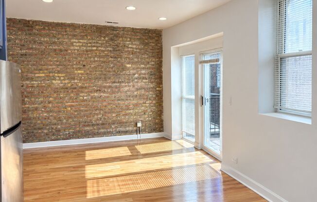 West Rogers Park Apartments With In-Unit Laundry and Exposed Brick