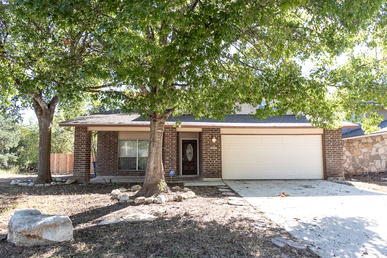 SPACIOUS 3 BR/2.5 BATH*FRESH PAINT THROUGHOUT*STAINLESS STEEL APPLIANCES**FIREPLACE IN LIVING AND MASTER*COVERED PATIO*OUTSIDE PATIO FROM MASTER*DECK IN BACK*EASY ACCESS TO LACKLAND AFB, SEA WORLD, UTSA, & SHOPPING