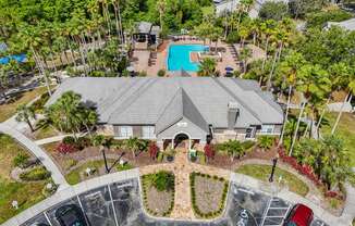 A large house with a pool in the backyard.