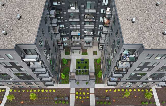 a birdseye view of a large apartment building