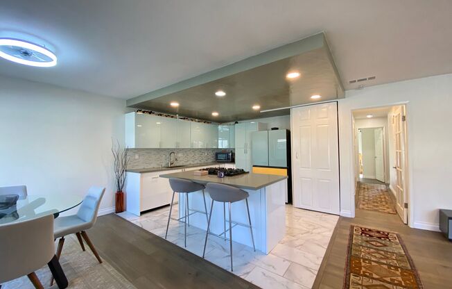 Stunning 3-bedroom, 2-bathroom coastal condo with Modern Custom Upgrades!