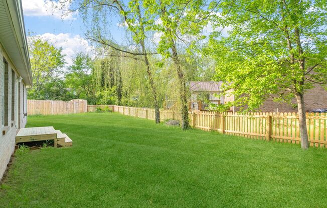 One level. Perfect location. Gorgeous yard.