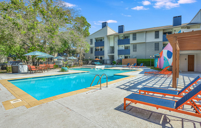 our apartments have a resort style pool with lounge chairs