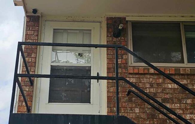 2nd story 2 bedroom, 1 bath condo with central heat and air and one car garage.