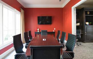 a large red chair in a room