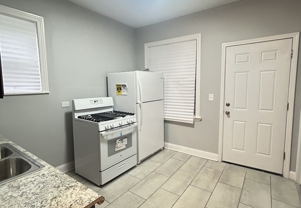 1852 W 58 ST