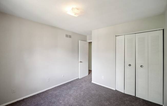 Bedroom with ample closet space | One Bedroom Apartments in Southfield, MI