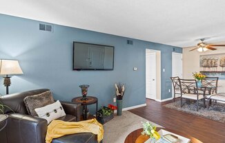 a living room with a couch and a tv