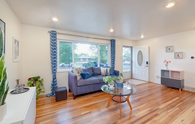 Mid-Century Charm Meets Modern Comfort | 4BR Aurora Home with Finished Basement