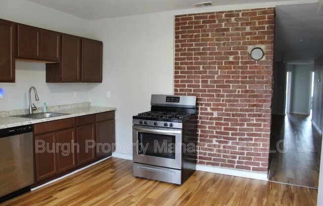 114 W 8 AVE