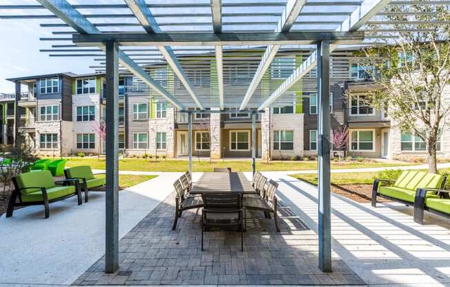 Outdoor gazebo with dinning table-style seating