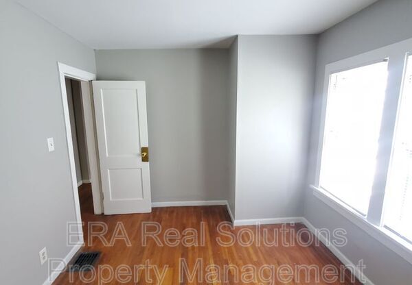 1296 E 23 AVE