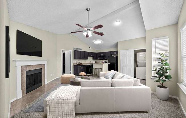 A living room with a fireplace and a couch.