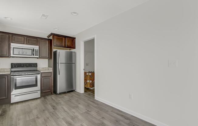 Kitchen with stainless steel appliances and wooden floors at Hudson Ridge, Red Lion, Pennsylvania