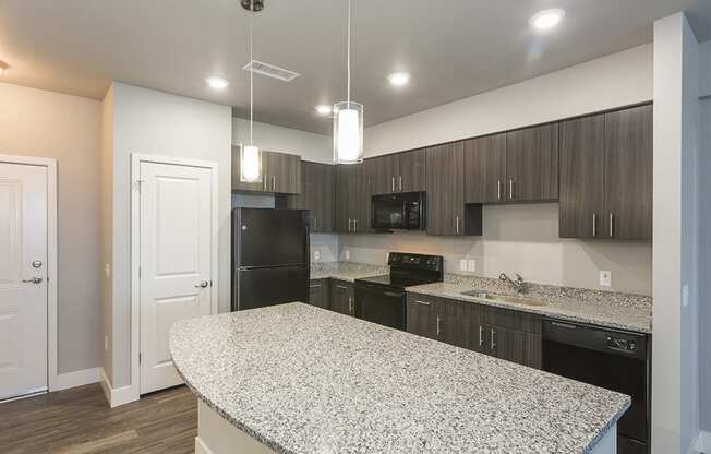 Apartment Kitchen with Island in Colorado Springs Near The Promenade Shops at Briargate