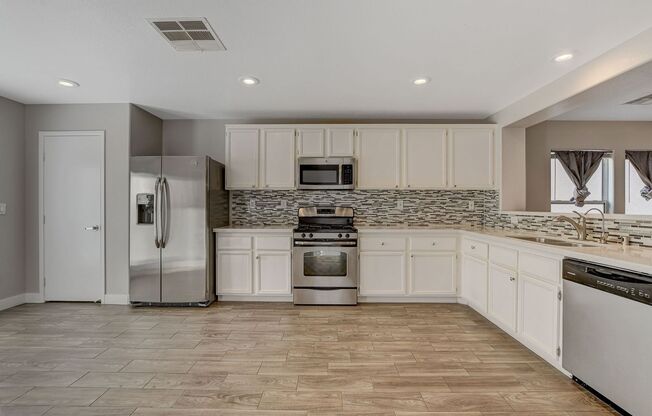 Totally Updated Solar Powered 4 Bedroom! Bedroom and Bath Downstairs!