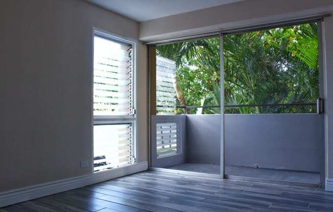 Napili Towers bedroom with glass doors to the balcony