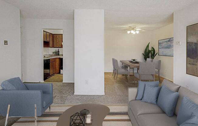 A living room with a grey couch and a blue chair.