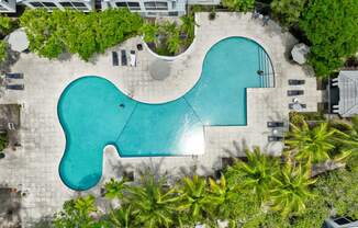 an aerial view of the pool at the resort