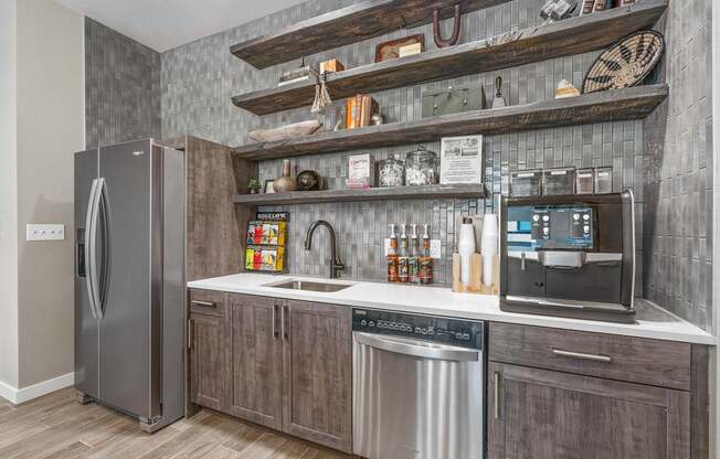 a kitchen with wooden cabinets and stainless steel appliances