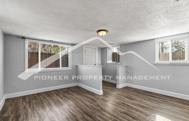 Quaint Home with Fenced Yard and Detached Garage!