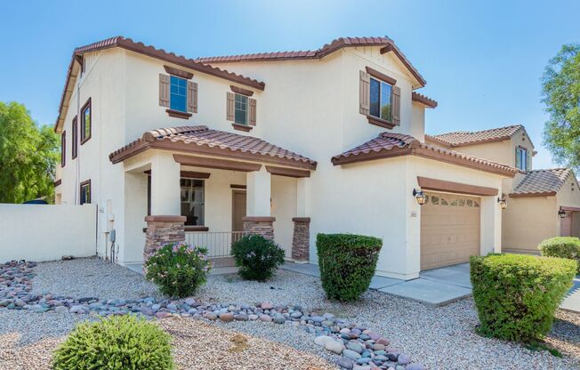 Spacious 4 bedroom home with full bath and bedroom downstairs