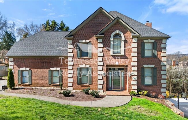 ABSOLUTELY STUNNING Executive Home across from A. L. Lotts School! Too many features to list!