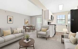 A living room with a grey couch, a coffee table, and a dining table.