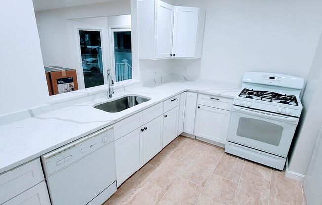 3-Story Townhouse with Central Heat, AC and 2 Parking Spots Included