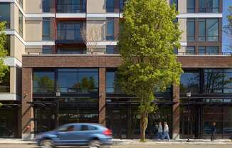 4730 California Apartments Building Exterior and Street