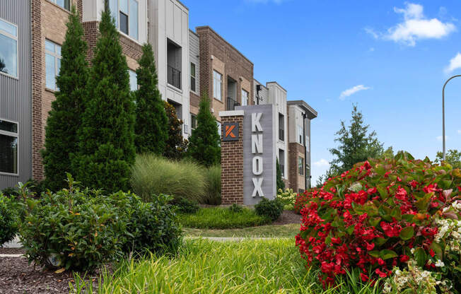an apartment building with a sign that says koyo on it