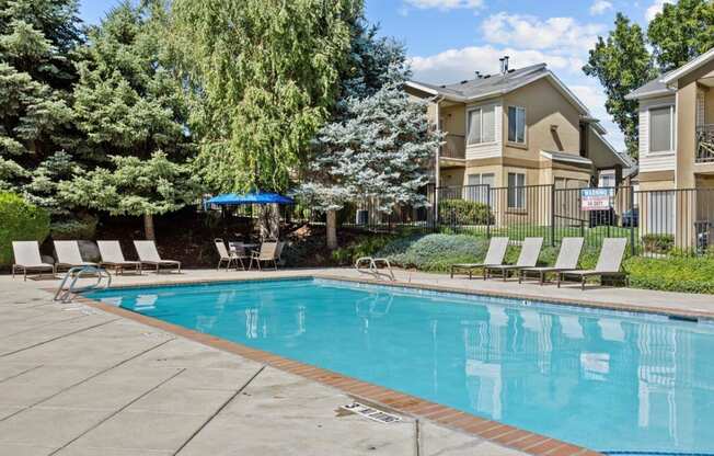 Heritage at Draper Apartments in Draper, Utah Pool with Lounge Chairs